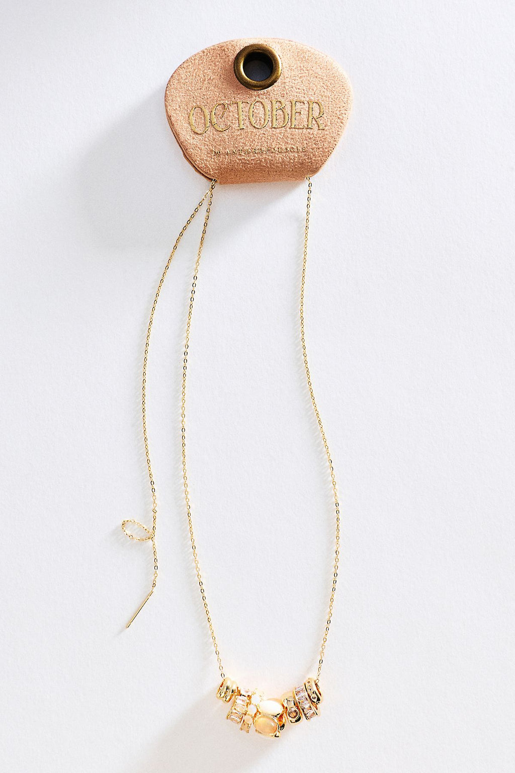 Collier à pendentif bague pierre de naissance By Anthropologie