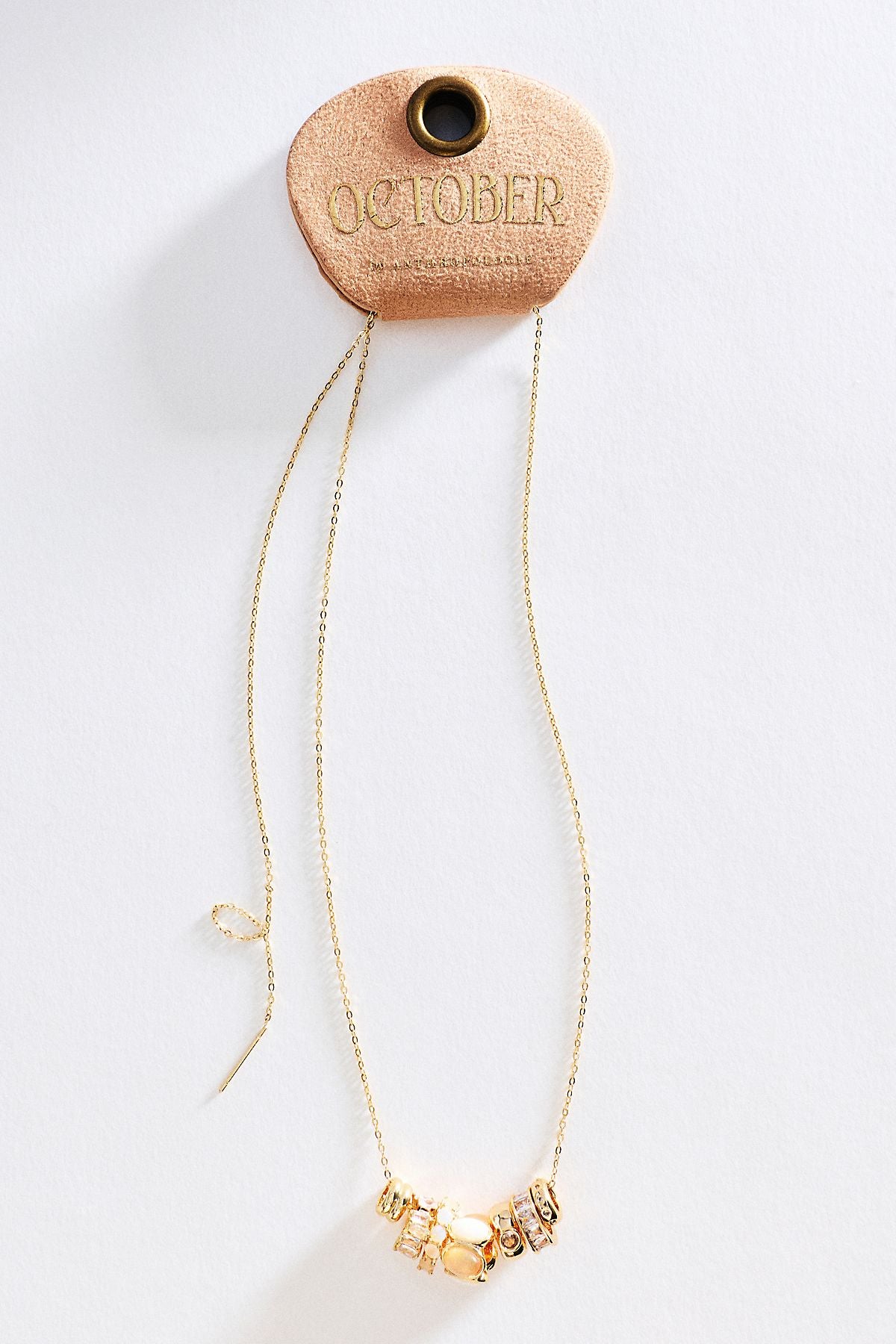 Collier à pendentif bague pierre de naissance By Anthropologie